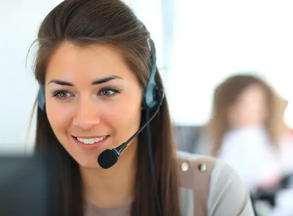 Customer support representative wearing a headset